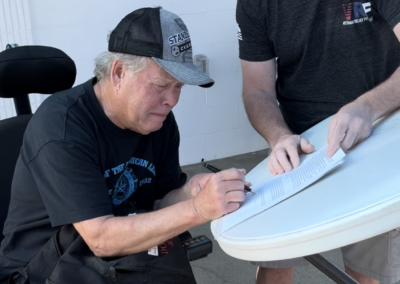Veteran signing to receive benefits